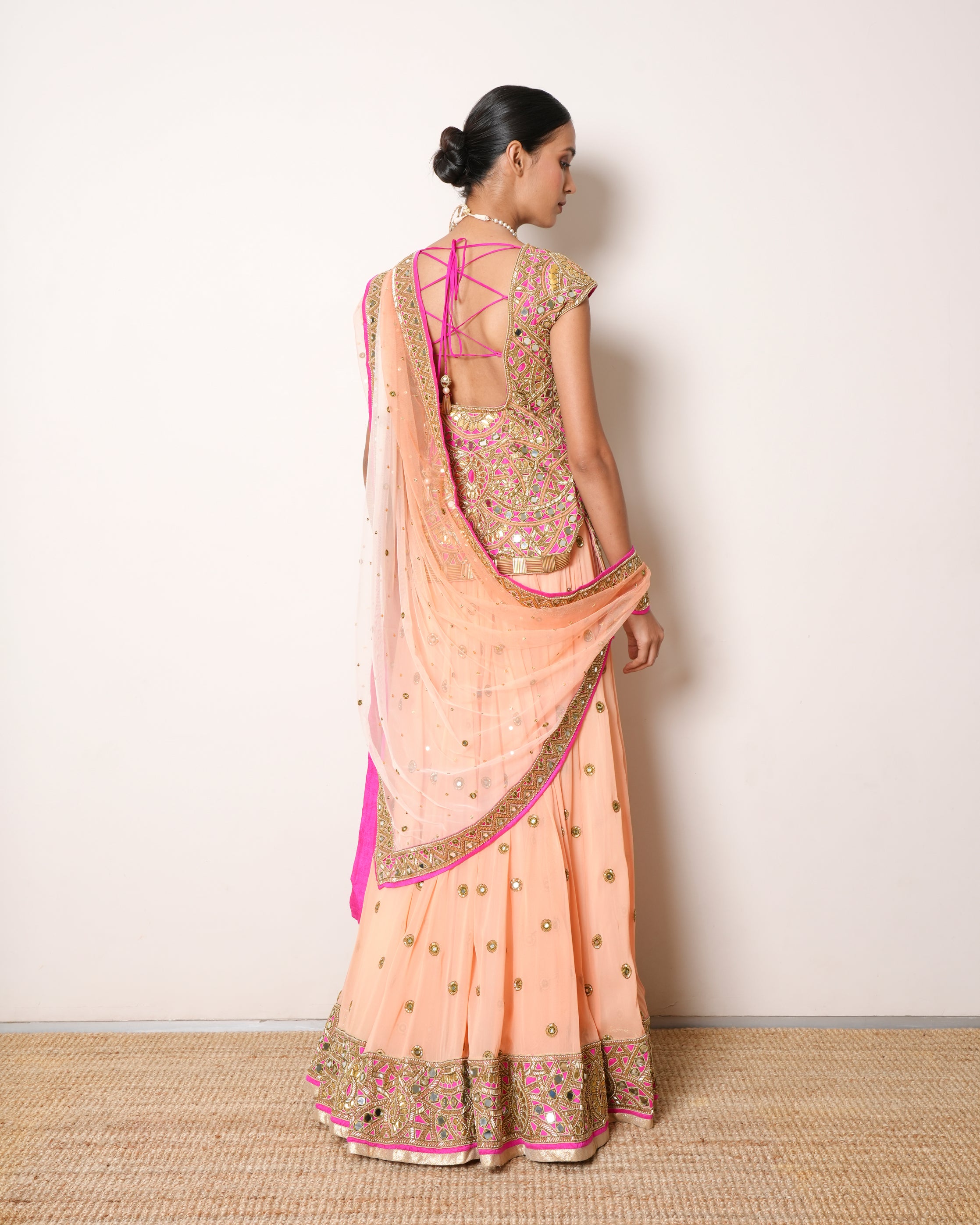 Arpita Mehta Peach Lehenga With Mirror Work