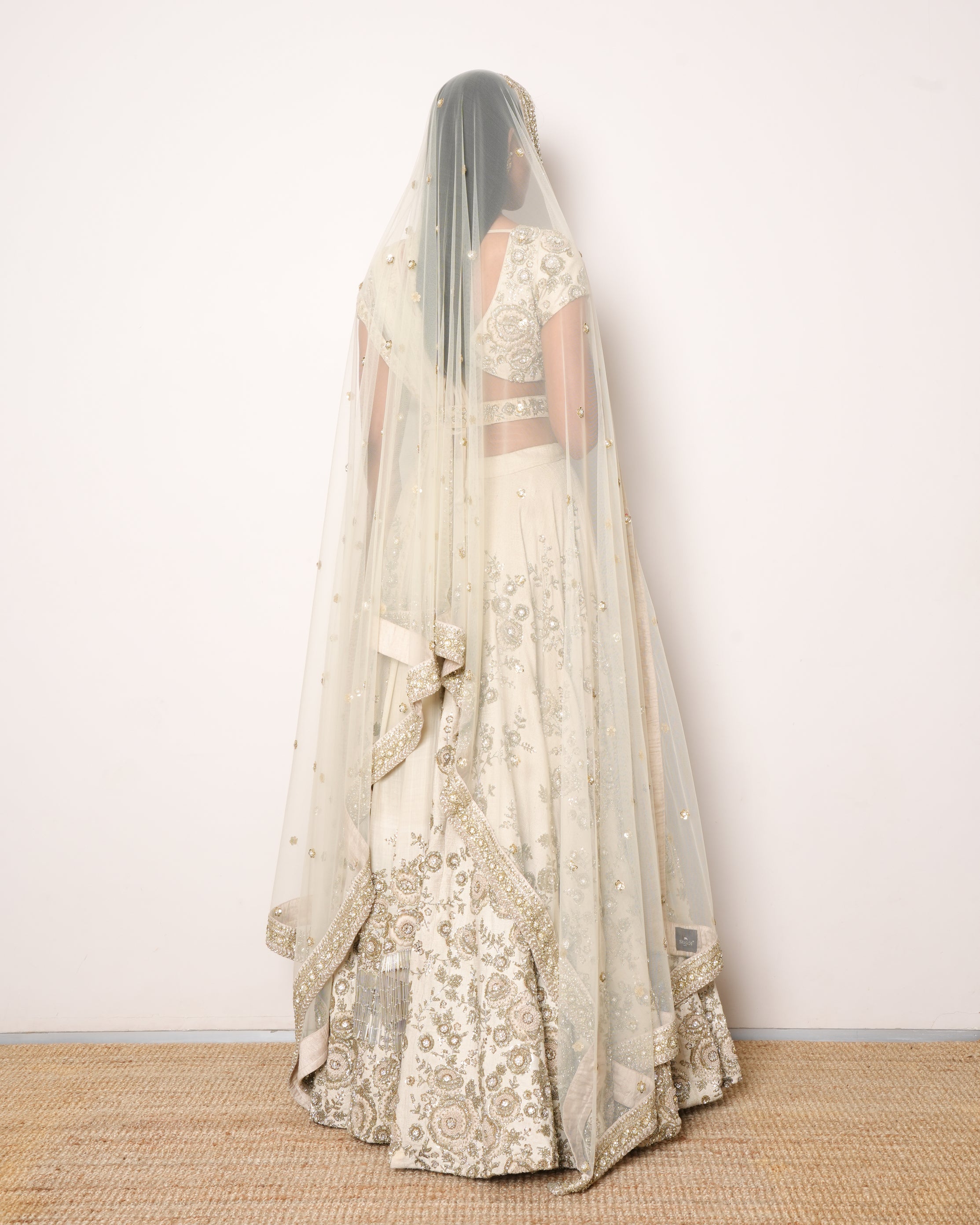 Sabyasachi Beige Lehenga With Heavy Zari & Sequins Work