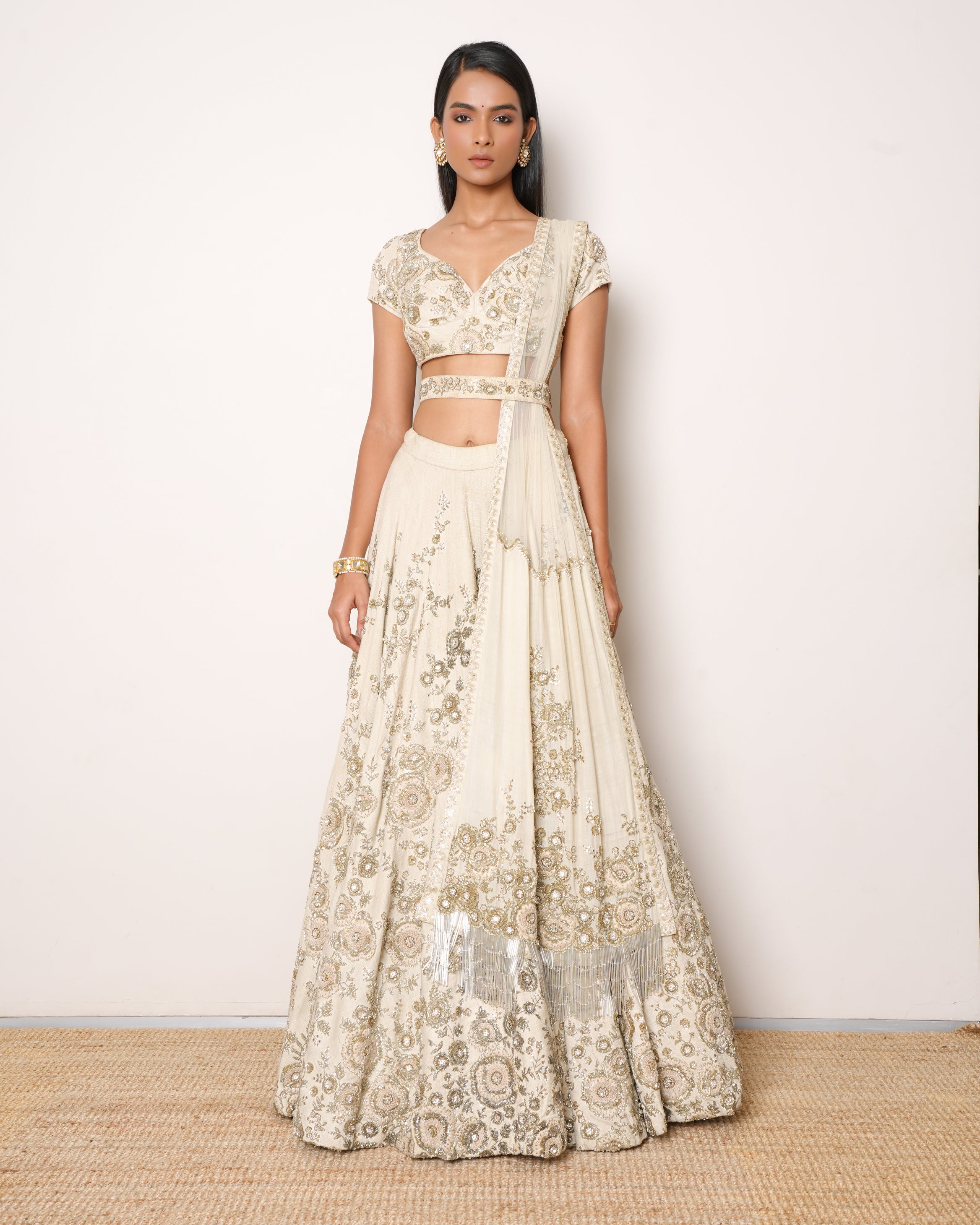 Sabyasachi Beige Lehenga With Heavy Zari & Sequins Work