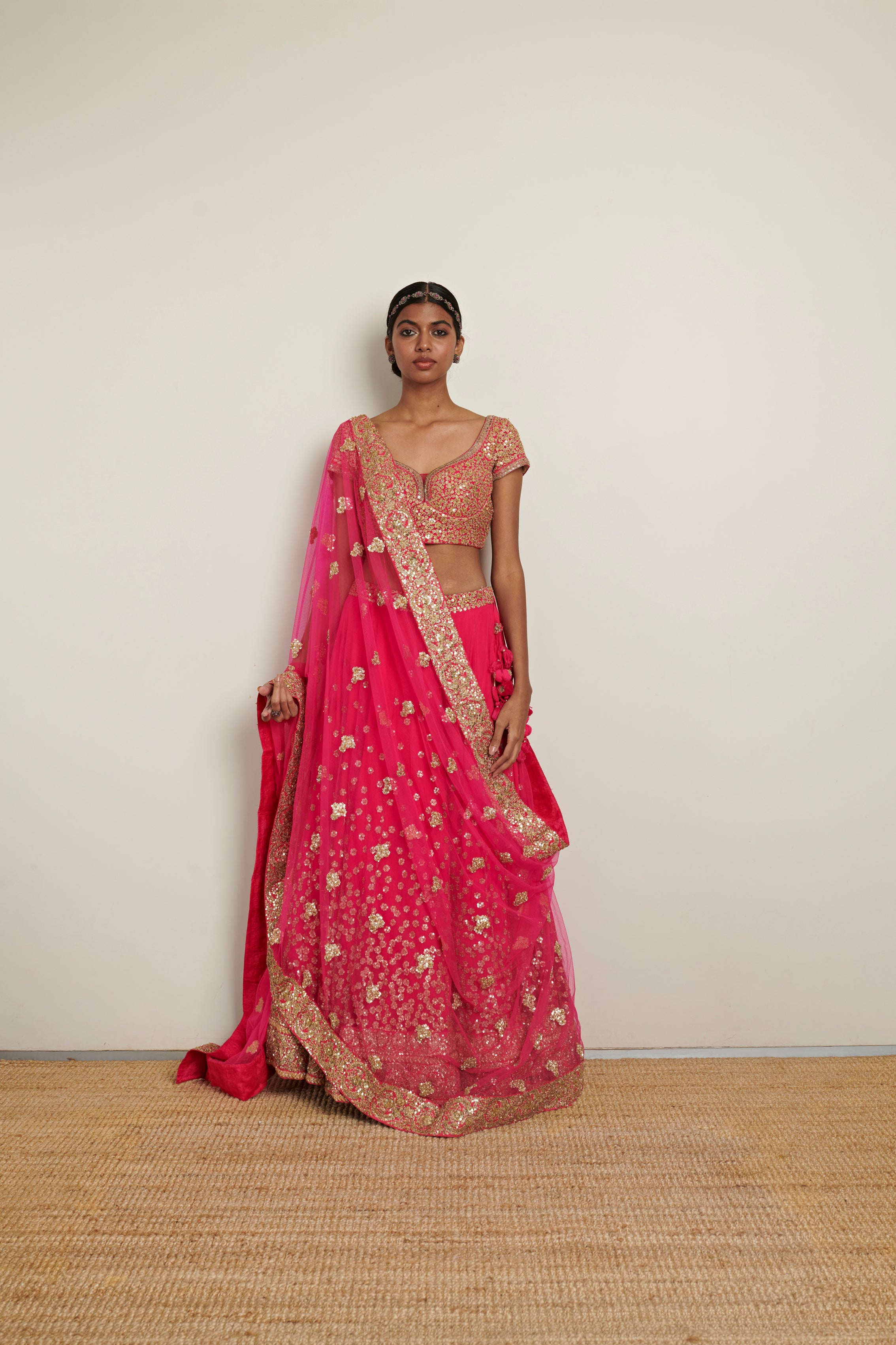 Stunning red and light pink ombre lehenga with cute pom pom bridal kaleere.  See more on wedmegood… | Indian bridal dress, Indian bridal outfits, Pink  bridal lehenga